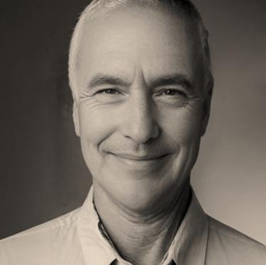 Portrait of Colin Kruger, Managing Partner at Enriched Communities